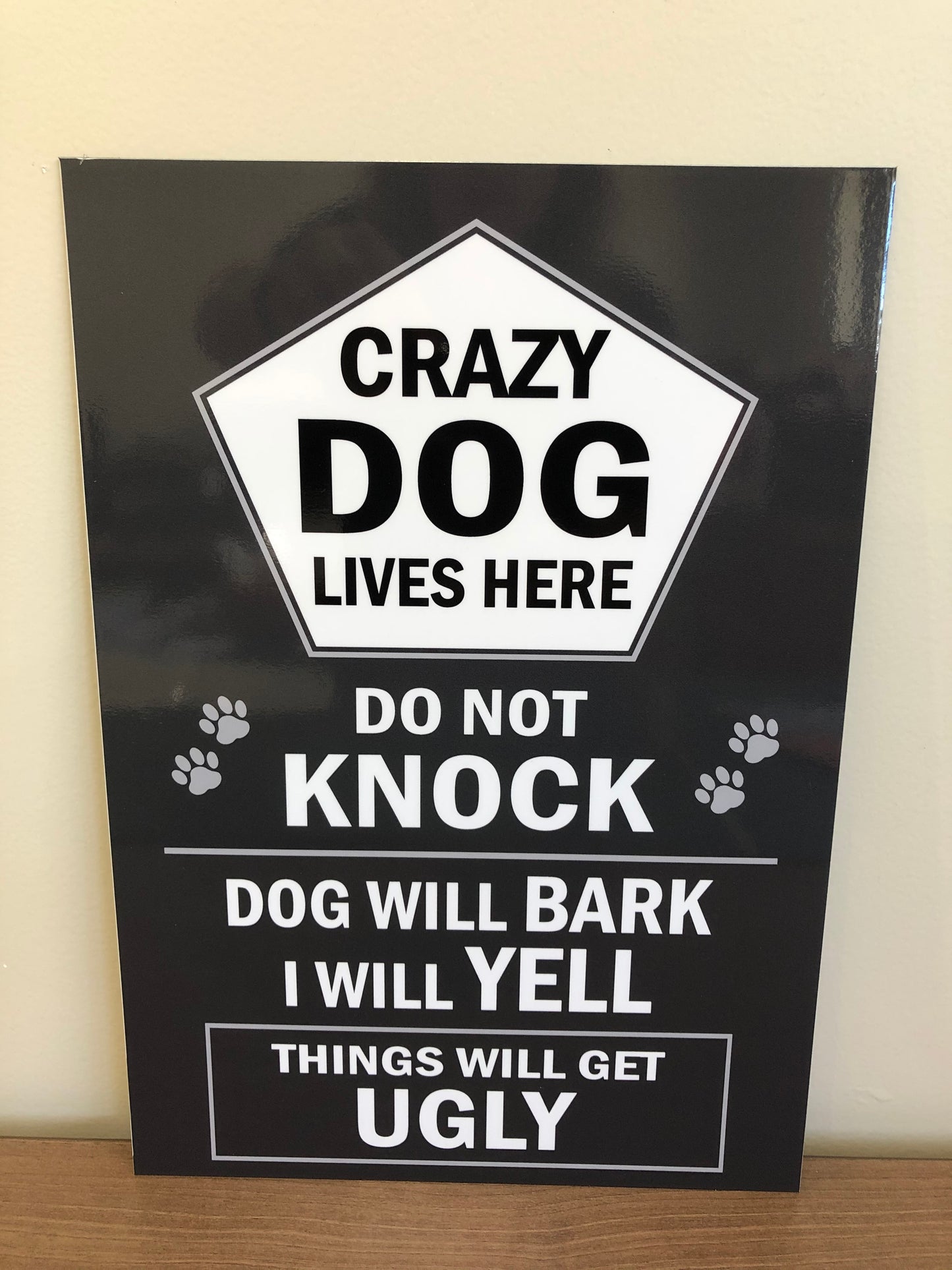 Crazy dog lives here sign