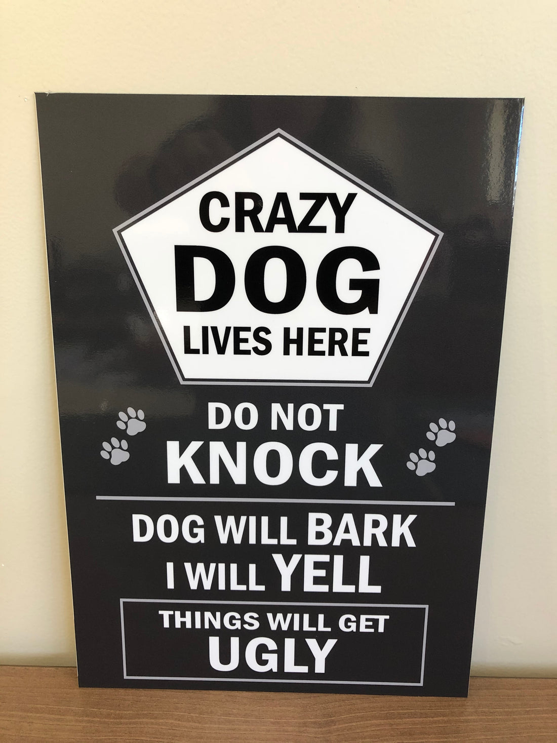 Crazy dog lives here sign