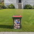 Green wheelie bin with large blue wren sticker